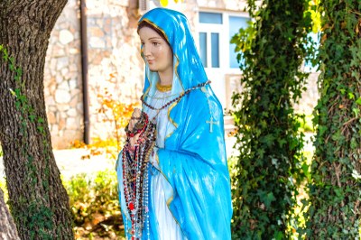 Statue of Mary in a garden at Medjugorje